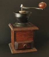 An old-fashioned manual coffee grinder