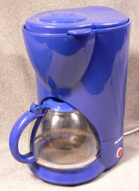 A blue Alaska brand coffeemaker.